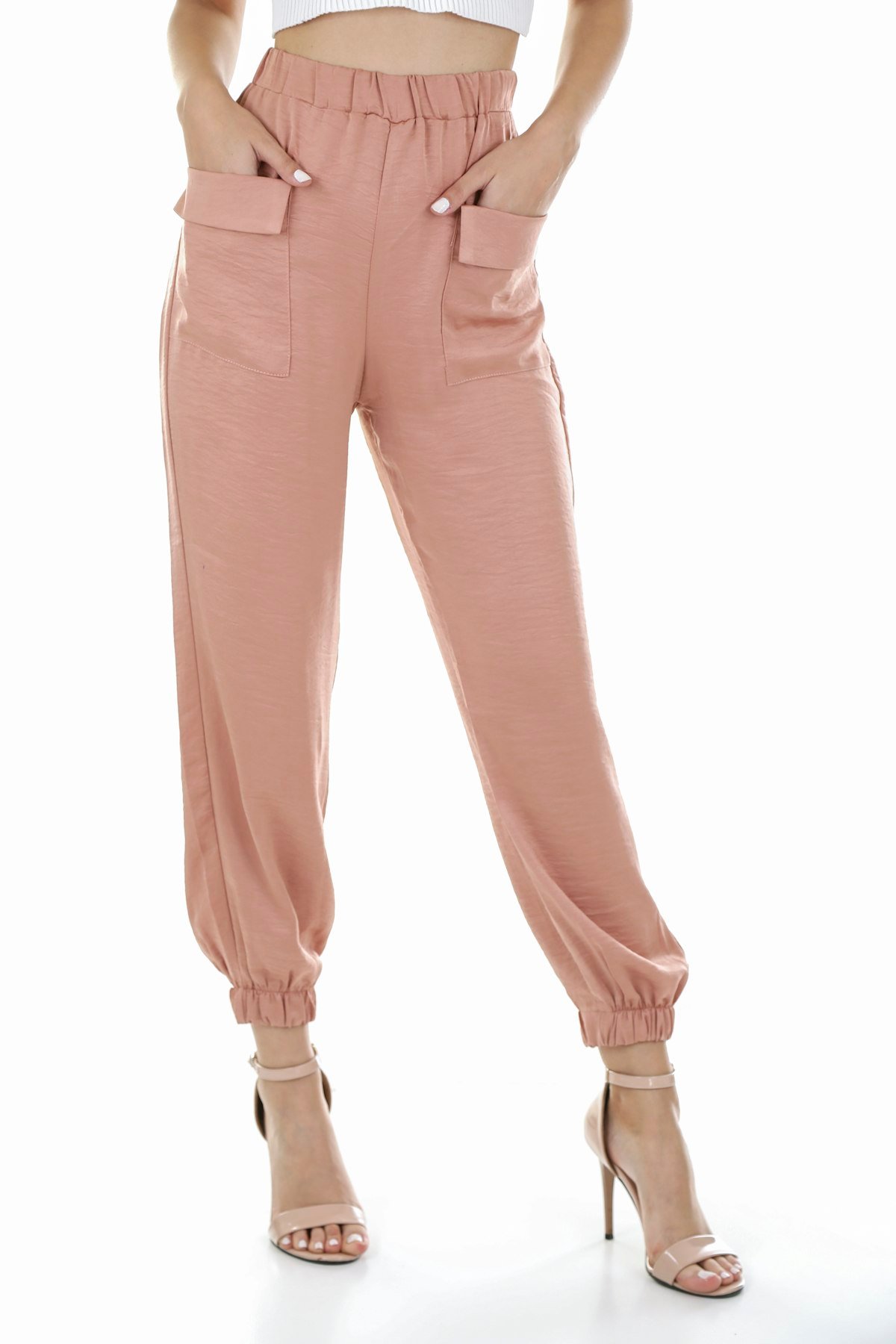 Blush pink relaxed-fit trousers in soft neutral styling